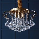 Traditional Floral Pendant Chandelier with Crystal Balls in Gold - 3/5 Bulb Option, 14"/18" Wide - This sleek pendant chandelier features a modern and traditional floral design, with faceted crystal balls drop hanging from a gold finish metal struct